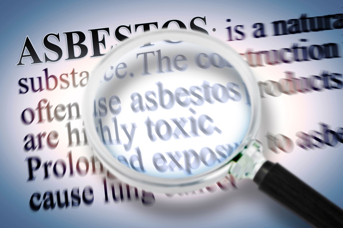 Definition of dangerous ASBESTOS - (It's a my personal definition and not infringes on another intellectual property rights) - Concept image seen through a magnifying glass